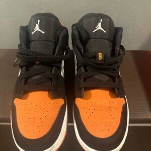 Air Jordan Black and Orange Sneakers